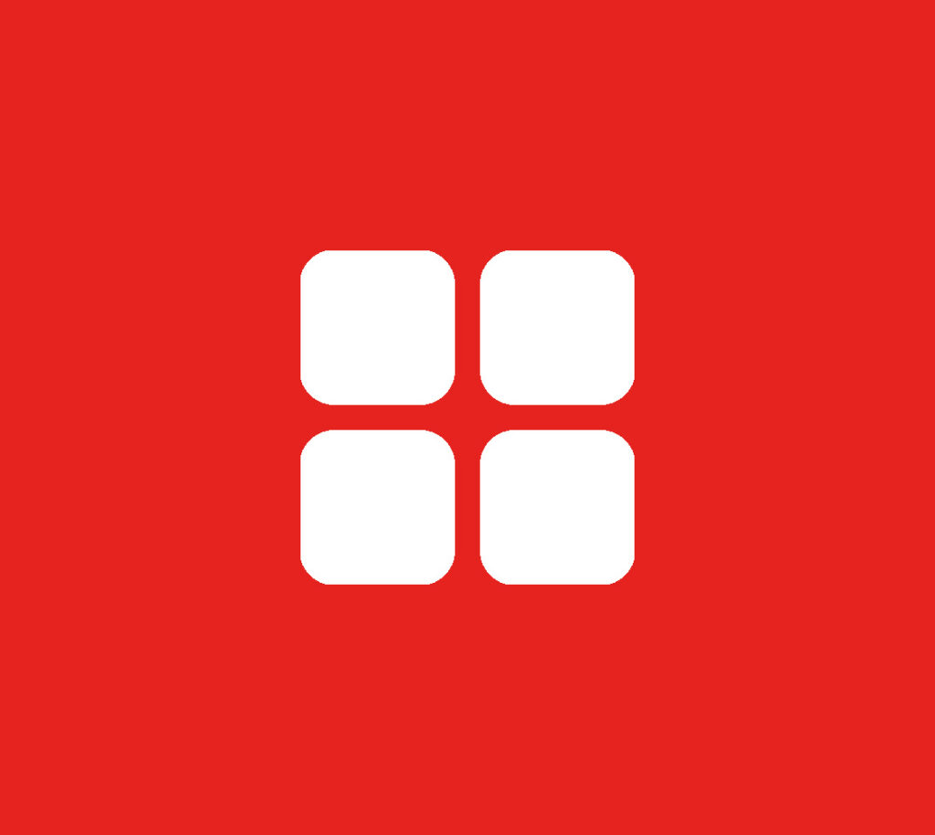Rote Kachel mit einem weißen Icon, das aus vier Quadraten besteht.